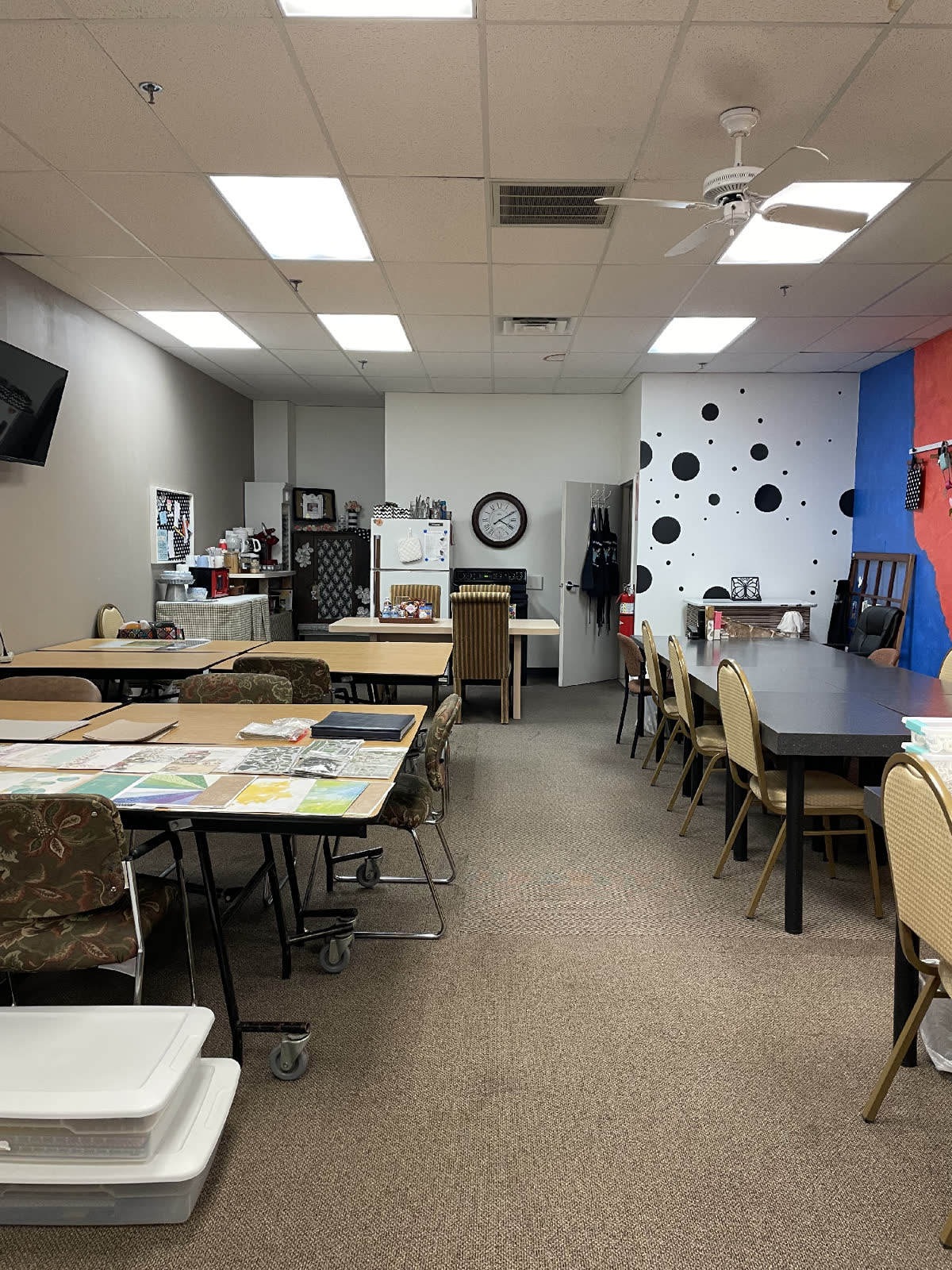 Classroom tables set up for scrapbook projects